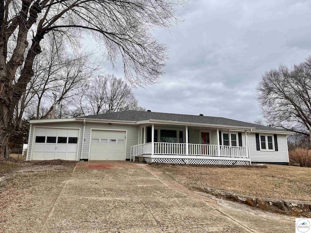 single story home featuring driveway, an attached garage, and a porch