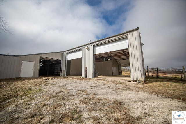 detached garage with fence