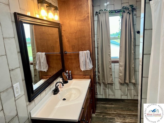 bathroom featuring vanity and wood finished floors