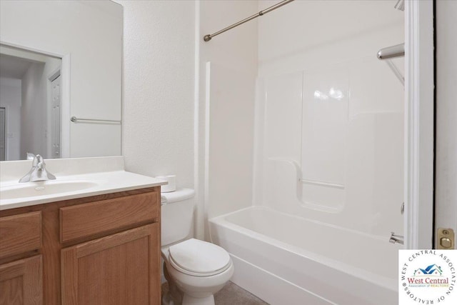 bathroom with vanity, toilet, and shower / washtub combination