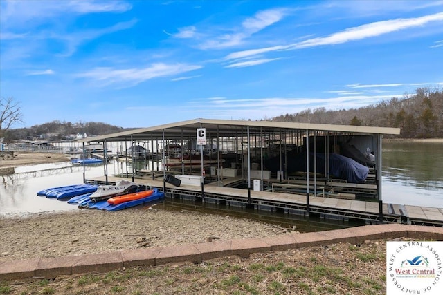 view of dock with a water view and boat lift