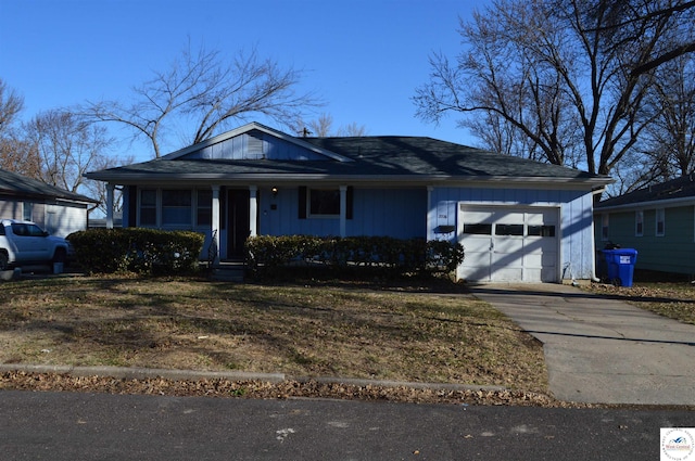 view of front of home featuring an attached garage and driveway