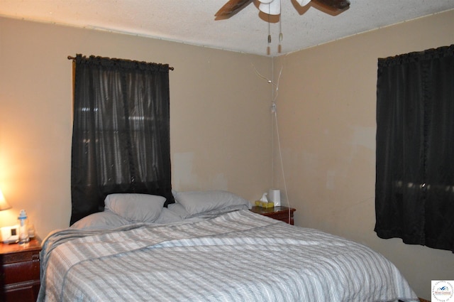 bedroom featuring a textured ceiling