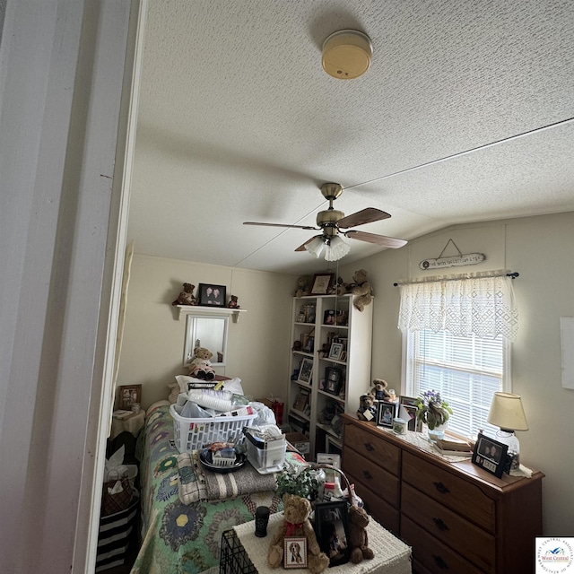 33039 Hilty Ave, Warsaw, MO 65355 - bedroom with a textured ceiling, ceiling fan, and lofted ceiling