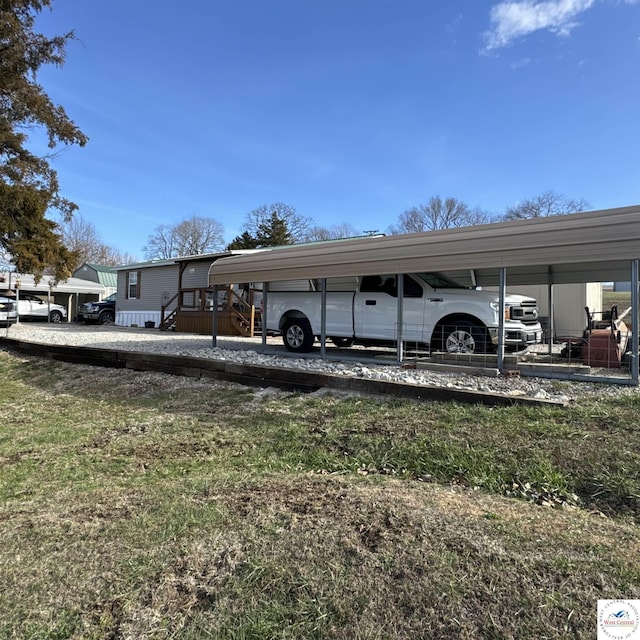 33039 Hilty Ave, Warsaw, MO 65355 - view of parking with a carport