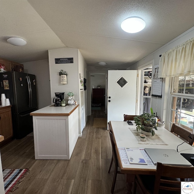 33039 Hilty Ave, Warsaw, MO 65355 - dining space featuring a textured ceiling and wood finished floors