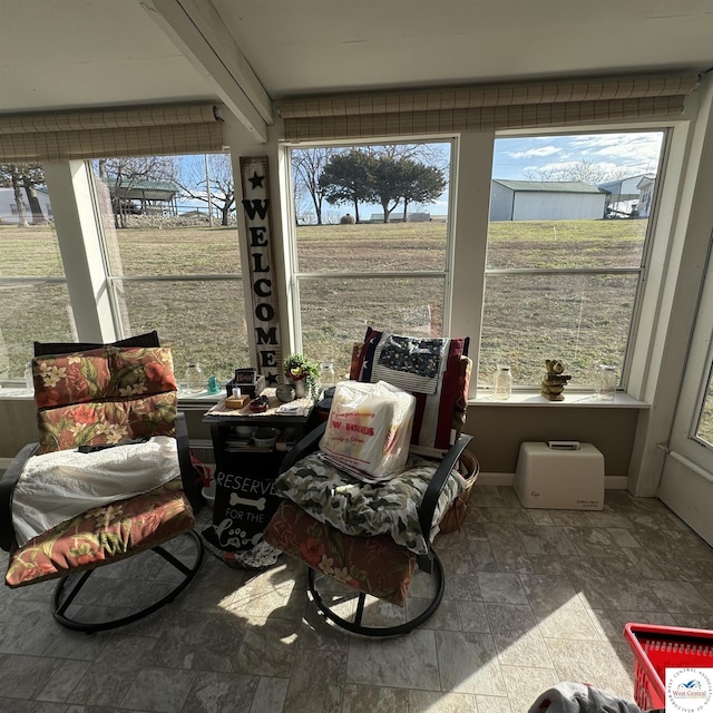 33039 Hilty Ave, Warsaw, MO 65355 - sunroom with stone finish floor and a healthy amount of sunlight
