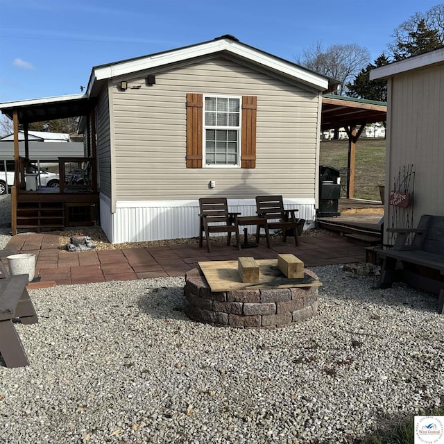 33039 Hilty Ave, Warsaw, MO 65355 - rear view of property with a patio