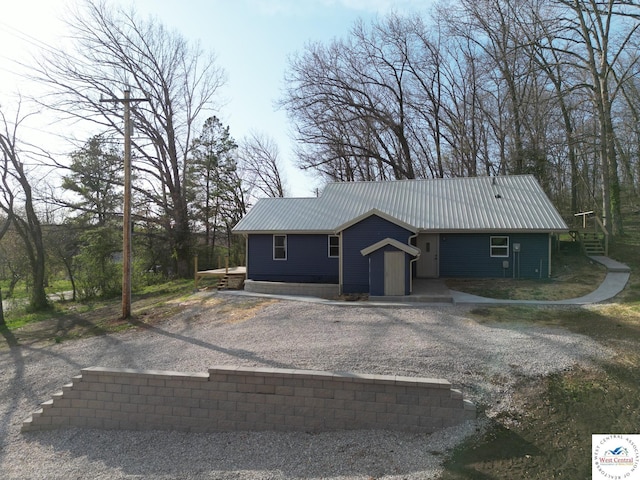 view of front of house featuring metal roof