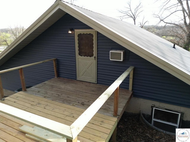 wooden terrace with an AC wall unit