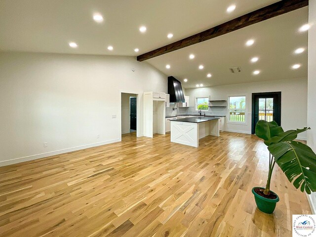 17788 Main Rd, Sedalia, MO 65301 - kitchen with open floor plan, light wood-type flooring, white cabinets, recessed lighting, and dark countertops