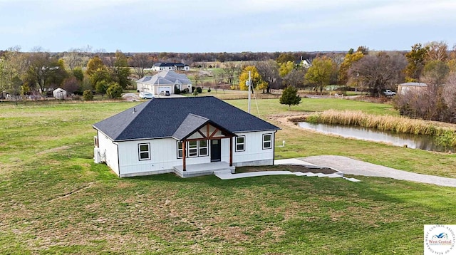 17788 Main Rd, Sedalia, MO 65301 - view of front of property featuring a front lawn and a porch