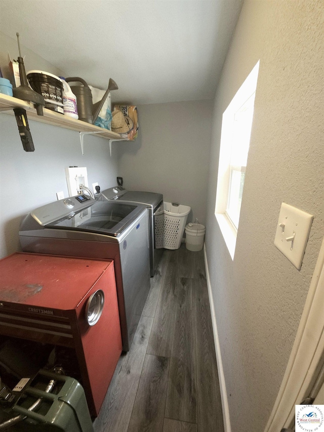 1012 E 7th St, Sedalia, MO 65301 - laundry room featuring washer and dryer, wood finished floors, and baseboards