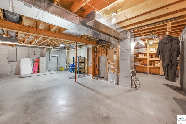 56 NW 247th Rd, Clinton, MO 64735 - unfinished below grade area featuring electric panel, water heater, and heating unit