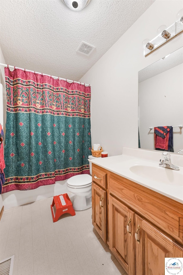 56 NW 247th Rd, Clinton, MO 64735 - bathroom featuring vanity, a textured ceiling, and shower / bath combo