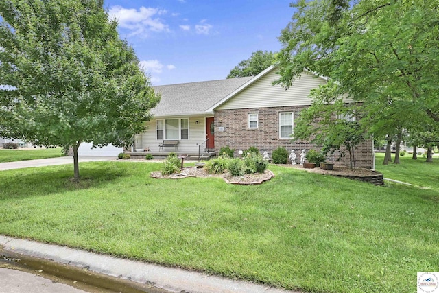 56 NW 247th Rd, Clinton, MO 64735 - ranch-style house with a front yard, brick siding, a garage, driveway, and covered porch