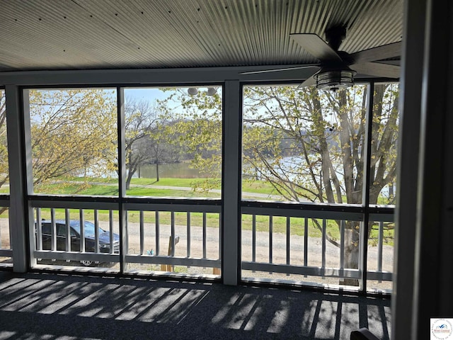 17509 Snowcap Loop, Warsaw, MO 65355 - unfurnished sunroom featuring a ceiling fan