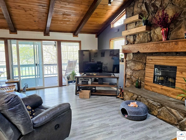 17509 Snowcap Loop, Warsaw, MO 65355 - living room with wooden ceiling, a stone fireplace, vaulted ceiling with beams, and wood finished floors