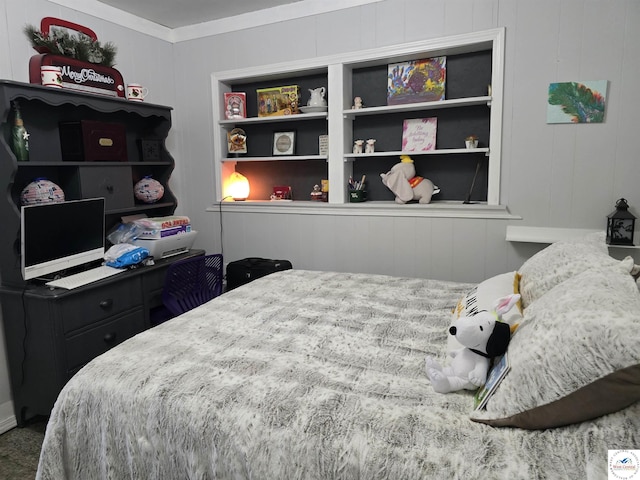 bedroom with ornamental molding