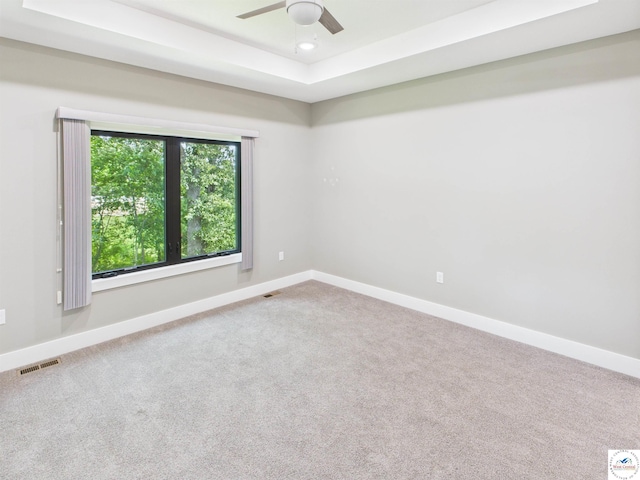 1248 Rich Blvd, Warrensburg, MO 64093 - carpeted empty room featuring ceiling fan, a raised ceiling, and recessed lighting