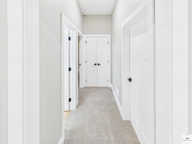 1248 Rich Blvd, Warrensburg, MO 64093 - hall with light colored carpet and baseboards