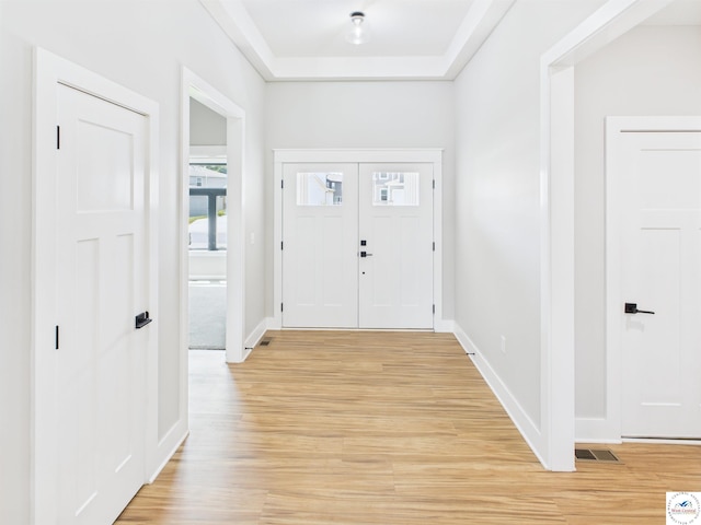 1248 Rich Blvd, Warrensburg, MO 64093 - foyer entrance with light wood finished floors and baseboards