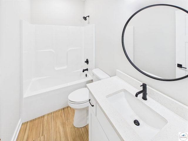 1248 Rich Blvd, Warrensburg, MO 64093 - full bath featuring wood finished floors, vanity, and shower / bath combination