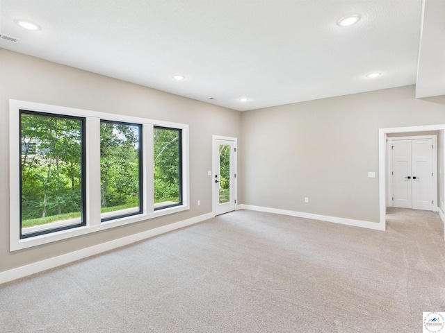 1248 Rich Blvd, Warrensburg, MO 64093 - unfurnished room featuring light colored carpet and recessed lighting
