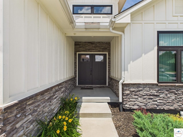1248 Rich Blvd, Warrensburg, MO 64093 - entrance to property with stone siding and board and batten siding