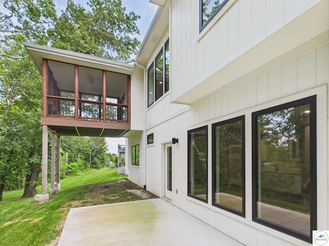 1248 Rich Blvd, Warrensburg, MO 64093 - view of patio with a sunroom