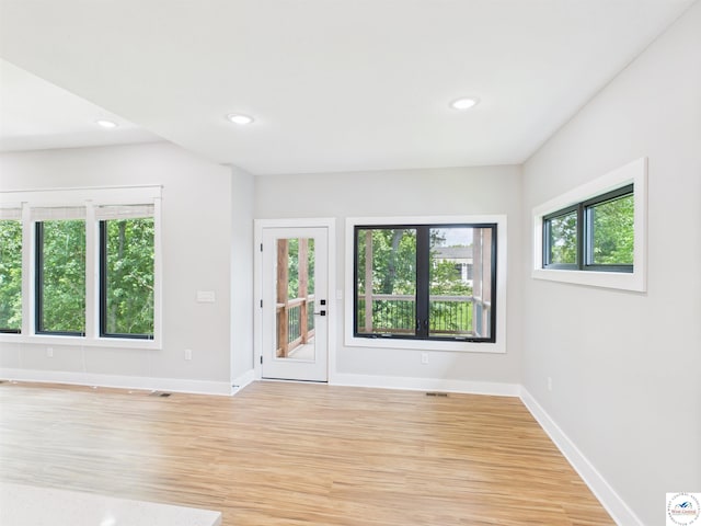 1248 Rich Blvd, Warrensburg, MO 64093 - foyer entrance featuring light wood-style floors and recessed lighting