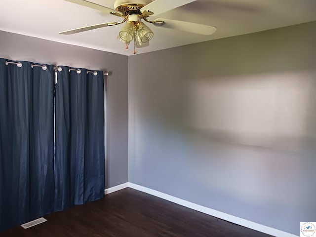 501 S Oak St, Versailles, MO 65084 - unfurnished room featuring wood finished floors and ceiling fan