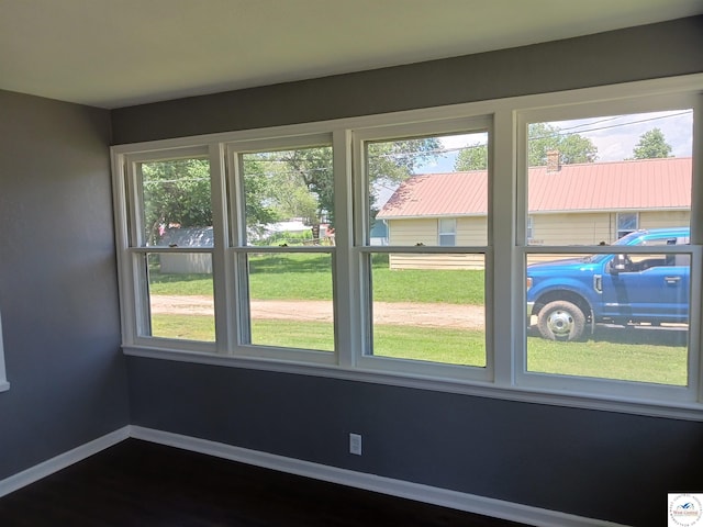 501 S Oak St, Versailles, MO 65084 - interior space featuring dark wood finished floors and baseboards