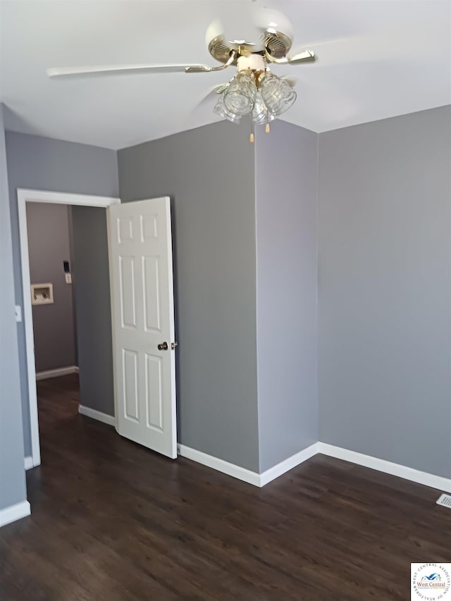 501 S Oak St, Versailles, MO 65084 - empty room with a ceiling fan and wood finished floors