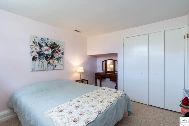 7020 Walnut Cir, Sedalia, MO 65301 - bedroom with visible vents and a closet