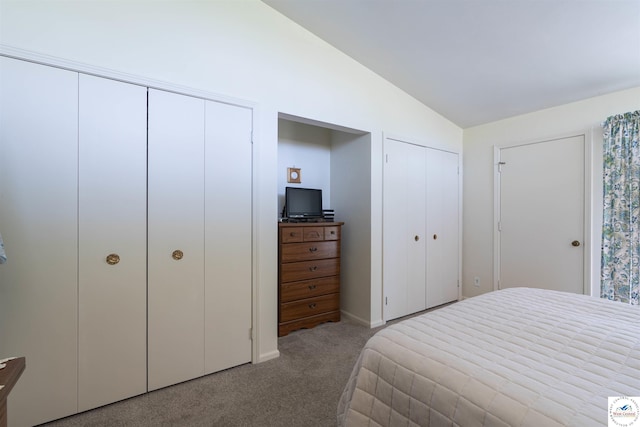 7020 Walnut Cir, Sedalia, MO 65301 - carpeted bedroom with two closets and vaulted ceiling