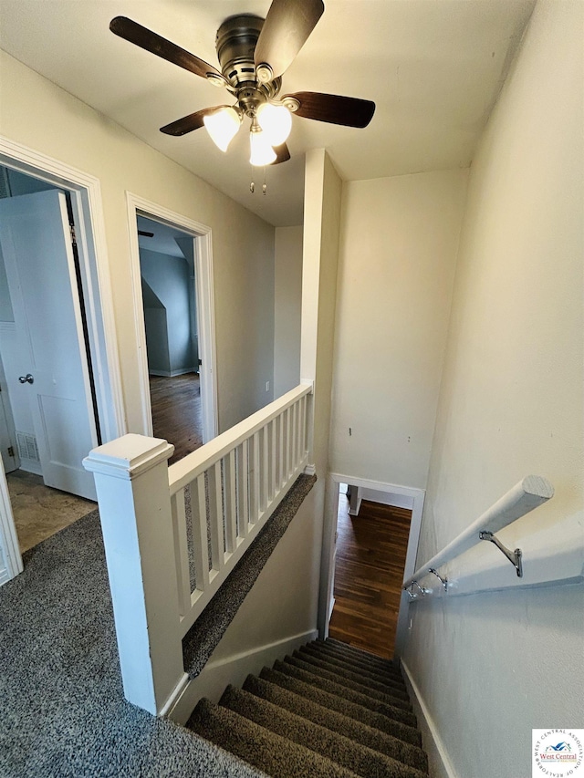 607 Laurel St, Warrensburg, MO 64093 - staircase with ceiling fan, carpet, and baseboards