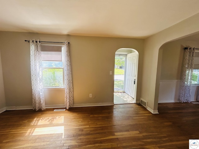 607 Laurel St, Warrensburg, MO 64093 - entryway featuring arched walkways and wood finished floors