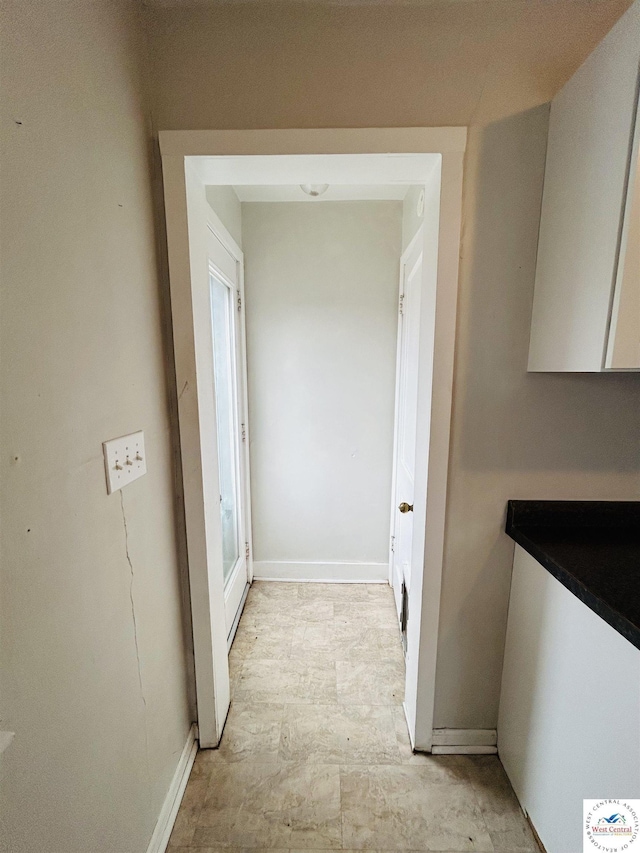 607 Laurel St, Warrensburg, MO 64093 - hall featuring baseboards