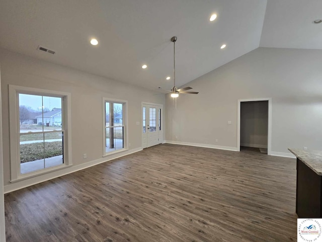 61 NW 247th Rd, Clinton, MO 64735 - unfurnished living room with visible vents, a healthy amount of sunlight, and dark wood-type flooring