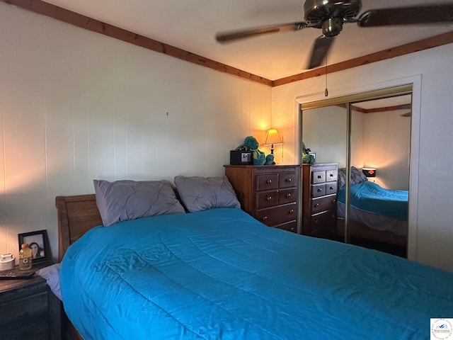 bedroom featuring a closet and a ceiling fan