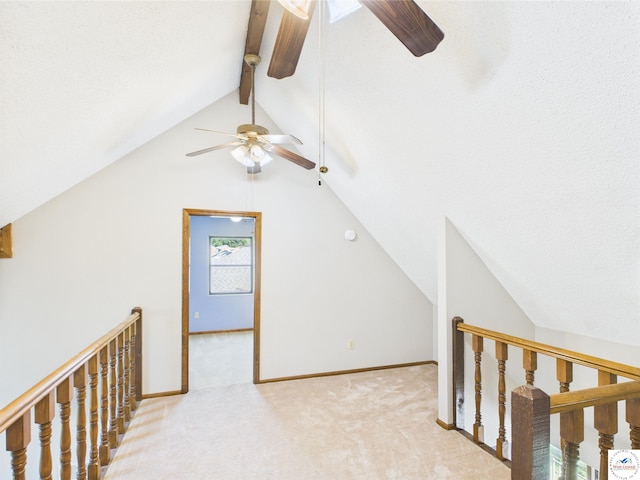 additional living space with a ceiling fan, carpet floors, and baseboards