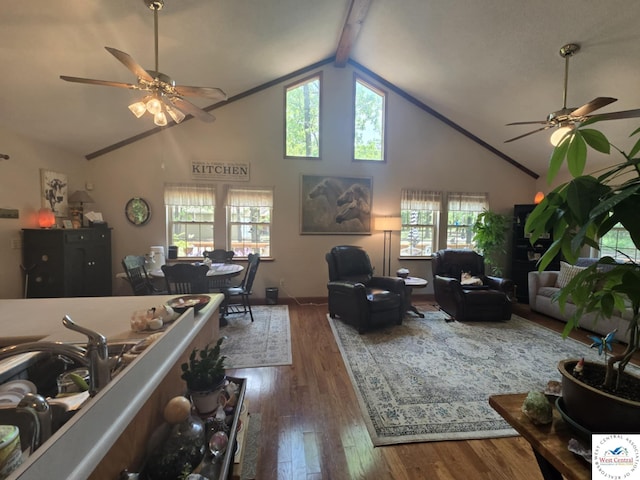 27349 Karrs Ave, Warsaw, MO 65355 - living area with ceiling fan, wood finished floors, high vaulted ceiling, and beamed ceiling