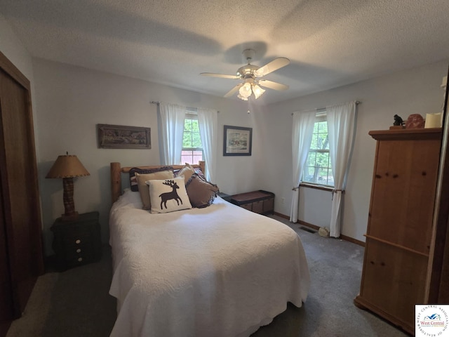 27349 Karrs Ave, Warsaw, MO 65355 - carpeted bedroom featuring ceiling fan, baseboards, and a textured ceiling