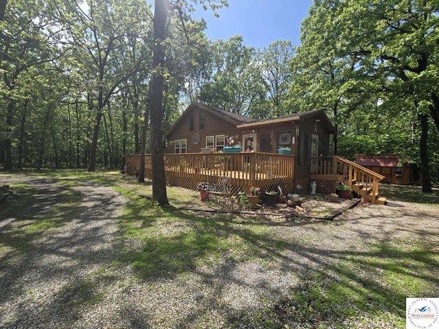27349 Karrs Ave, Warsaw, MO 65355 - rear view of house with a wooden deck and an outdoor structure