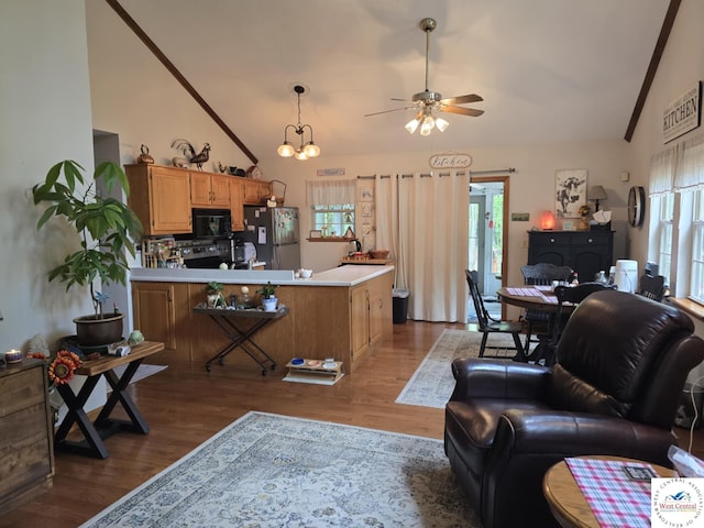 27349 Karrs Ave, Warsaw, MO 65355 - living room with a ceiling fan, dark wood-type flooring, and high vaulted ceiling