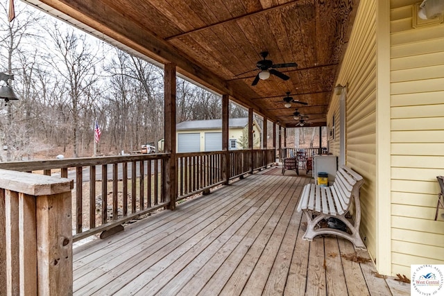 25733 Macks Ave, Warsaw, MO 65355 - wooden terrace with an outbuilding and ceiling fan