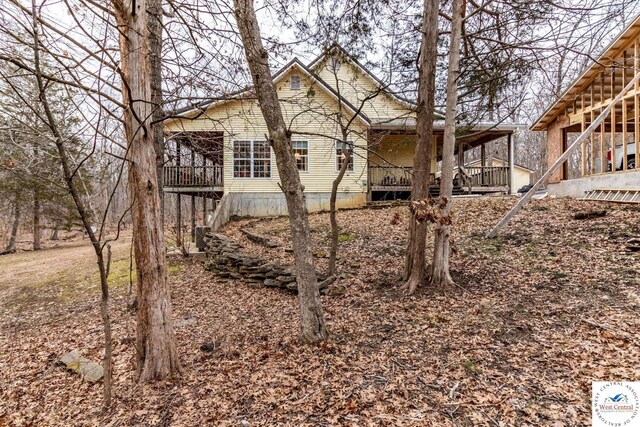 25733 Macks Ave, Warsaw, MO 65355 - view of side of home featuring a deck