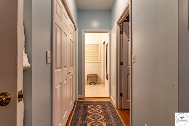 25733 Macks Ave, Warsaw, MO 65355 - hall featuring dark wood-style flooring and baseboards