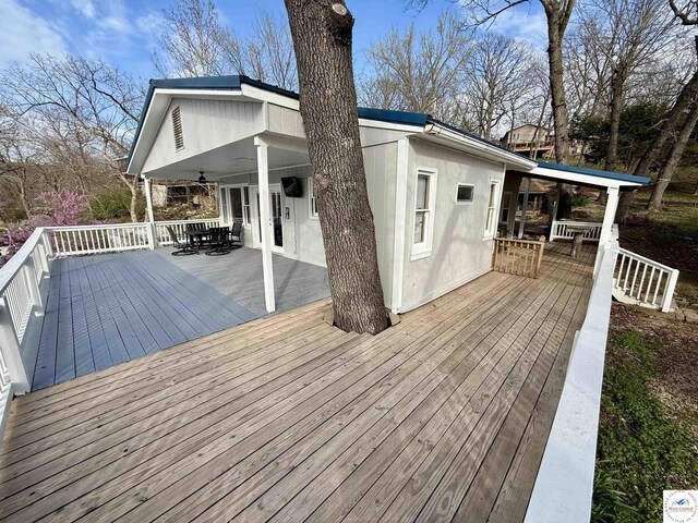 19242 Quail Rd, Warsaw, MO 65355 - wooden deck with outdoor dining space